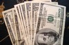 Gold jumps to $517 as dollar slips